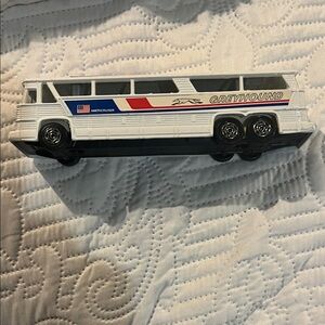 Greyhound Americruiser by Corgi Model Red, White and Blue Toy Bus. KK575